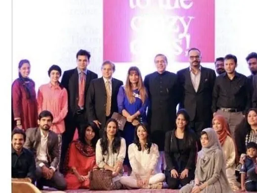 The Here's to the Crazy Ones company on stage