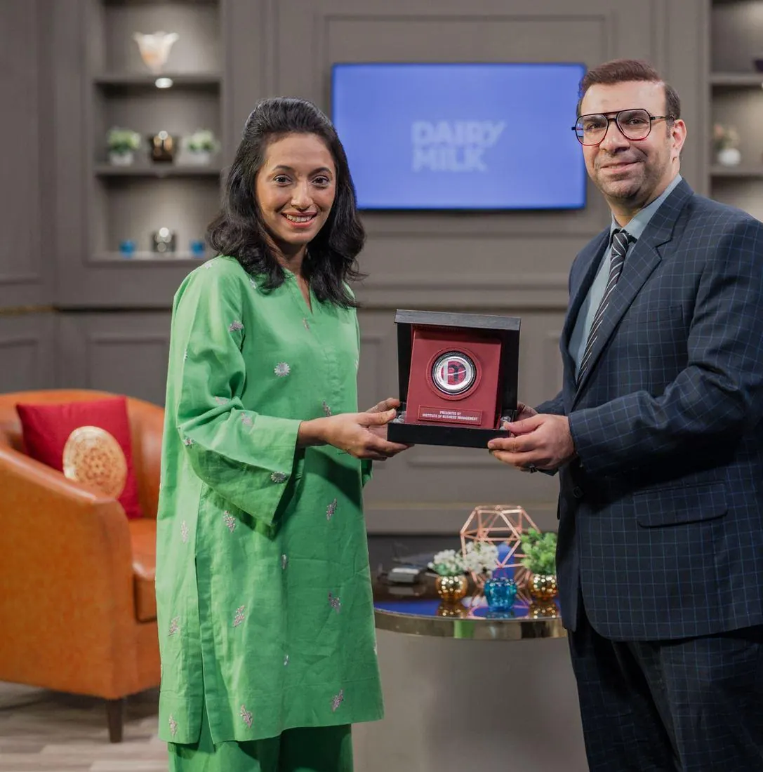 Sarah Mashhood with a guest on the Celebrating Sweet Success set