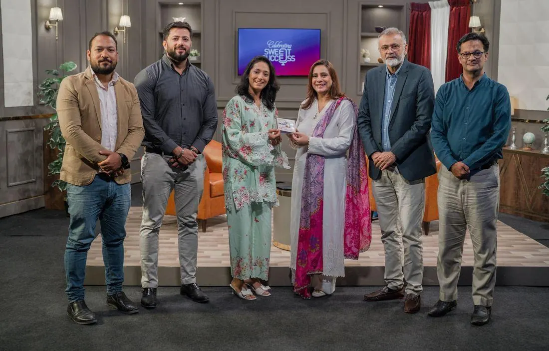 Sarah Mashhood with guests and the production team on the studio floor
